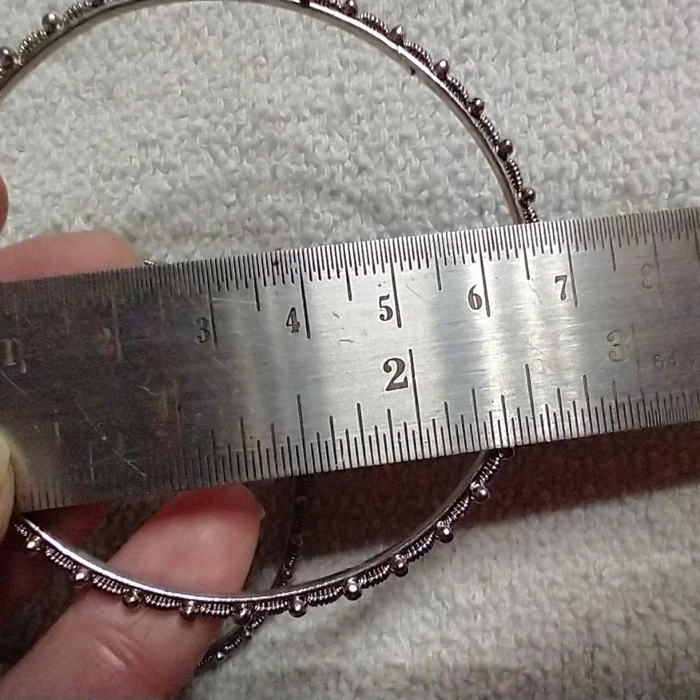 Set of 2 bangle bracelets approx. 2.5 wide.